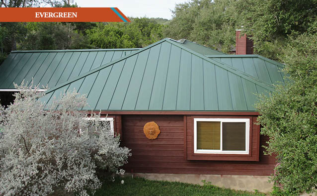 A Evergreen style metal roof on a one story cabin home.