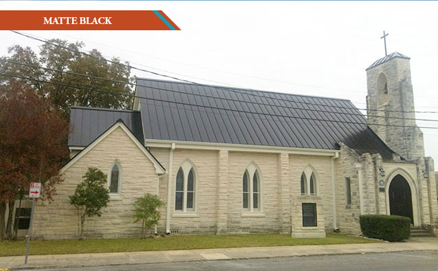 A Matte Black style metal roof on a historic church.
